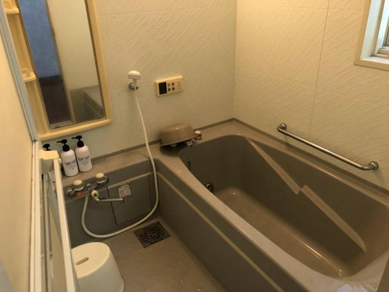 Golden Mile Apartment Amami Exterior photo